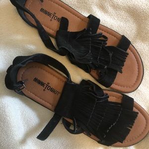 Brand new black Minnetonka’s. Size 37.